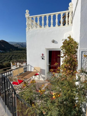 Rojo - An apartment with shared pool & hot tub with stunning views in Oria, Oria
